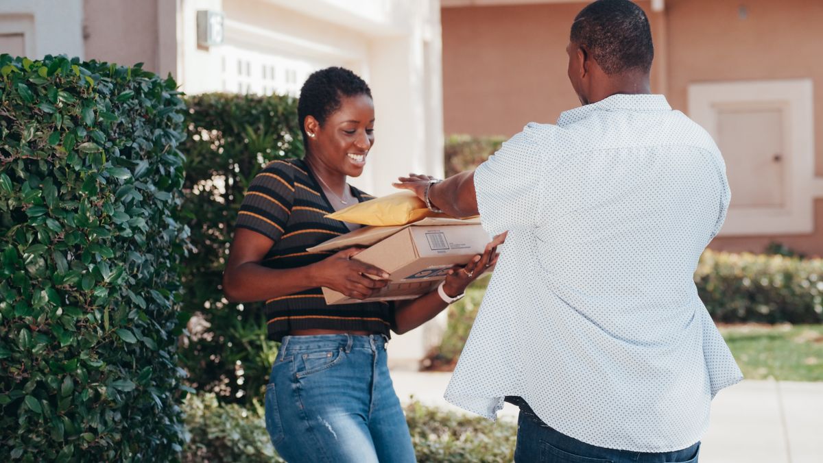Courier handing over packages